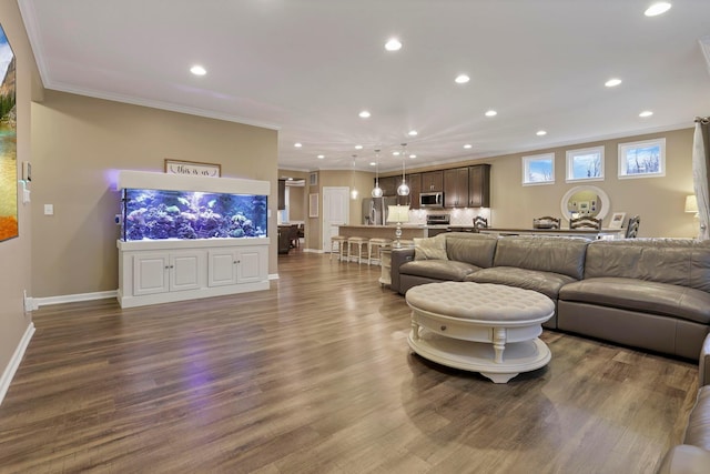 2267 Holiday Valley Dr, Grove City, OH 43123 - living room featuring crown molding, recessed lighting, and dark wood-style floors
