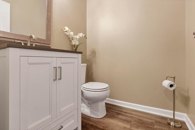2267 Holiday Valley Dr, Grove City, OH 43123 - bathroom featuring wood finished floors and vanity
