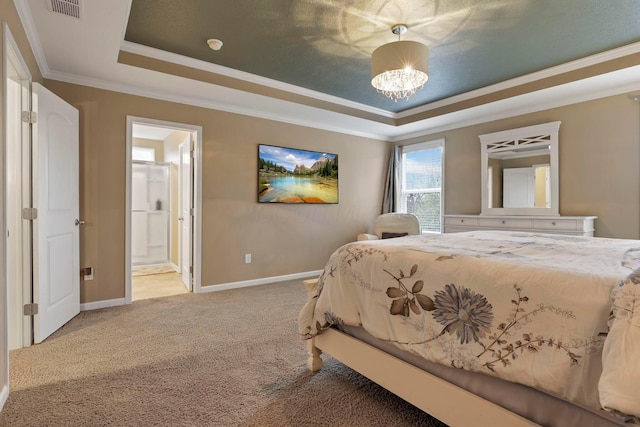 2267 Holiday Valley Dr, Grove City, OH 43123 - carpeted bedroom featuring a tray ceiling, ornamental molding, ensuite bath, and a chandelier