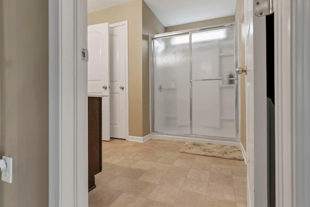2267 Holiday Valley Dr, Grove City, OH 43123 - bathroom featuring a shower stall and baseboards
