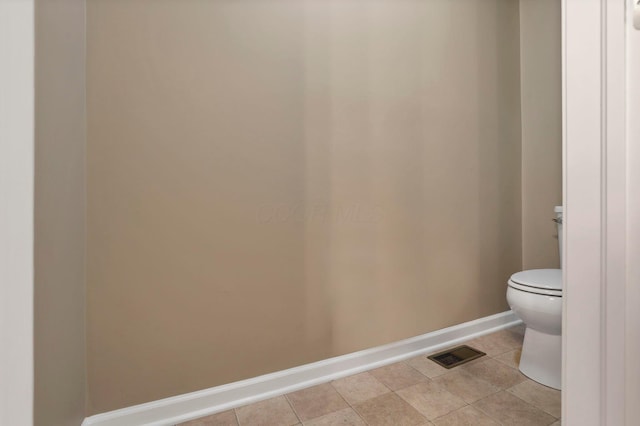 2267 Holiday Valley Dr, Grove City, OH 43123 - bathroom with baseboards and tile patterned floors