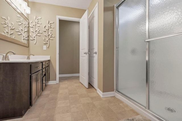 2267 Holiday Valley Dr, Grove City, OH 43123 - bathroom with double vanity and a shower stall