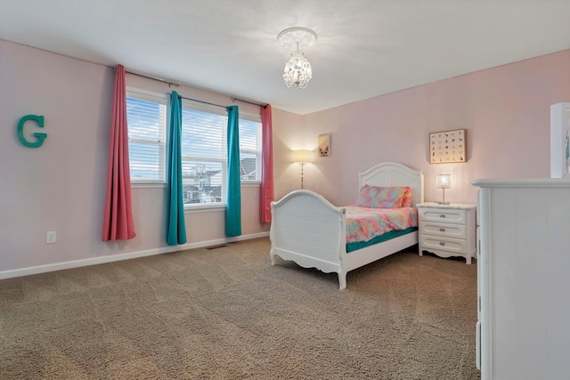 2267 Holiday Valley Dr, Grove City, OH 43123 - bedroom with a chandelier and carpet flooring