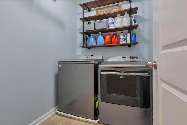 2267 Holiday Valley Dr, Grove City, OH 43123 - laundry room with independent washer and dryer and light tile patterned flooring