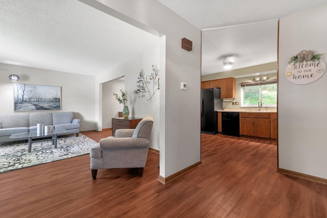 8547 Seabright Dr, Powell, OH 43065 - living room featuring dark wood finished floors and a textured ceiling