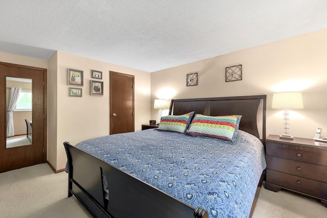 8547 Seabright Dr, Powell, OH 43065 - bedroom featuring light colored carpet and a textured ceiling
