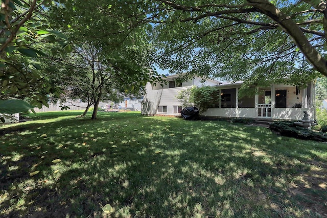 8547 Seabright Dr, Powell, OH 43065 - view of green lawn featuring a sunroom