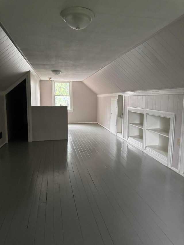 5542 Emerson Ave, Worthington, OH 43085 - additional living space with vaulted ceiling and hardwood / wood-style floors