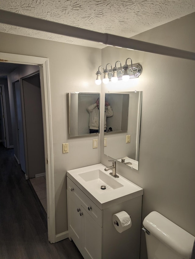 6679 Brock St, Dublin, OH 43017 - half bathroom with wood finished floors and vanity