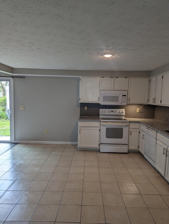 6679 Brock St, Dublin, OH 43017 - kitchen featuring white appliances, white cabinetry, a textured ceiling, backsplash, and light tile patterned floors