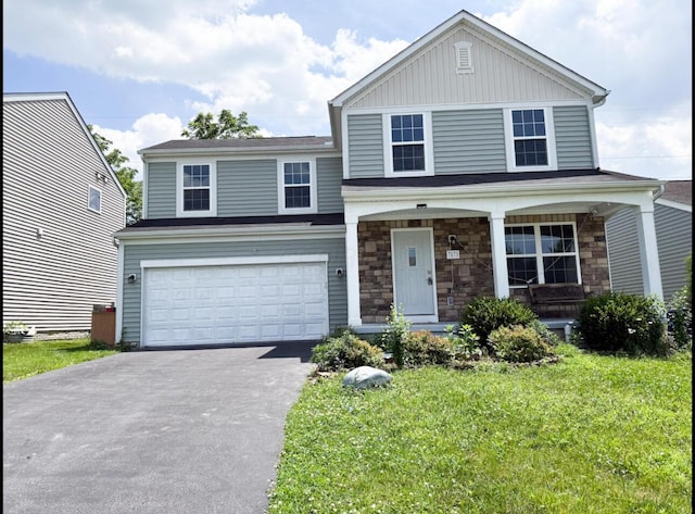 7173 Serenoa Dr, Reynoldsburg, OH 43068 - view of front of property with driveway, an attached garage, a front lawn, a porch, and stone siding