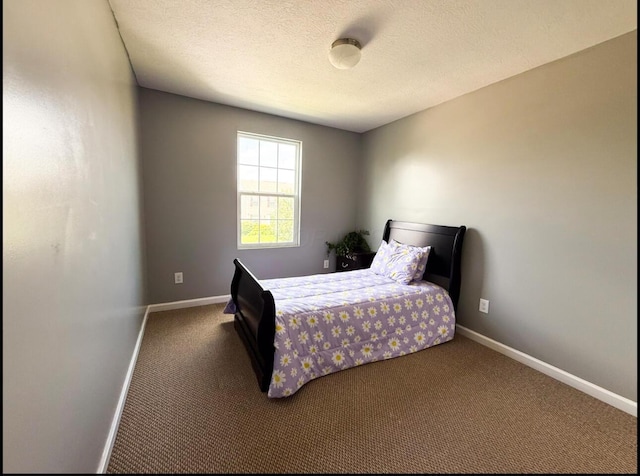 7173 Serenoa Dr, Reynoldsburg, OH 43068 - carpeted bedroom with baseboards and a textured ceiling