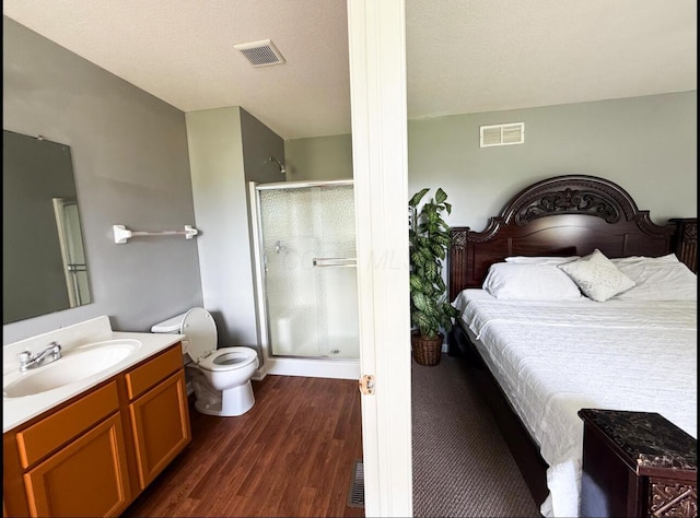 7173 Serenoa Dr, Reynoldsburg, OH 43068 - bedroom featuring a sink and dark wood-type flooring