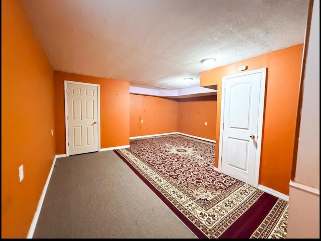 7173 Serenoa Dr, Reynoldsburg, OH 43068 - finished basement with a textured ceiling and carpet flooring