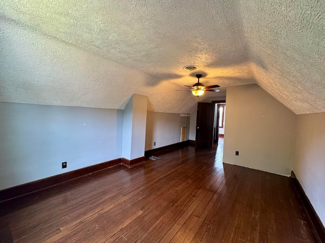 940 W 3rd St, Logan, OH 43138 - bonus room with a textured ceiling, a ceiling fan, hardwood / wood-style floors, and lofted ceiling