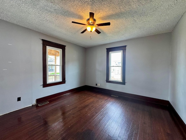 940 W 3rd St, Logan, OH 43138 - unfurnished room featuring hardwood / wood-style flooring, a ceiling fan, and a textured ceiling