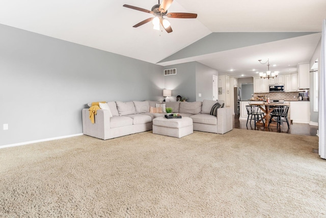 2063 Hayer Ct, Lewis Center, OH 43035 - living area featuring a chandelier, vaulted ceiling, a ceiling fan, recessed lighting, and dark carpet