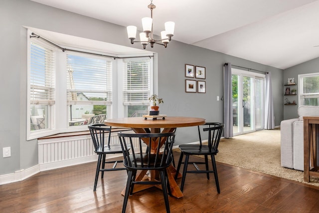 2063 Hayer Ct, Lewis Center, OH 43035 - dining space with a chandelier, dark wood finished floors, lofted ceiling, and radiator heating unit
