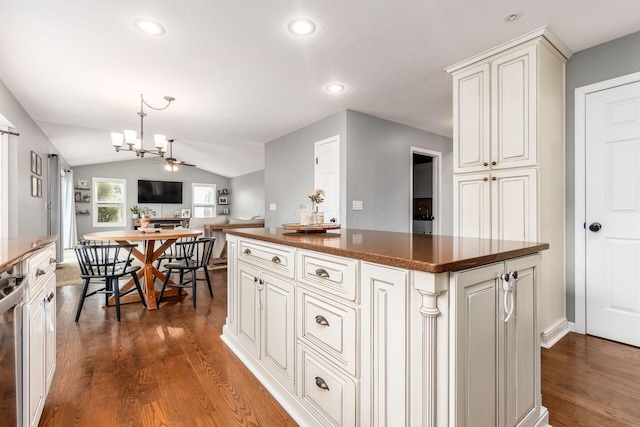 2063 Hayer Ct, Lewis Center, OH 43035 - kitchen with a chandelier, dark wood-type flooring, vaulted ceiling, recessed lighting, and open floor plan