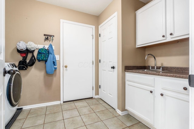2063 Hayer Ct, Lewis Center, OH 43035 - laundry room featuring cabinet space, washing machine and dryer, and light tile patterned floors