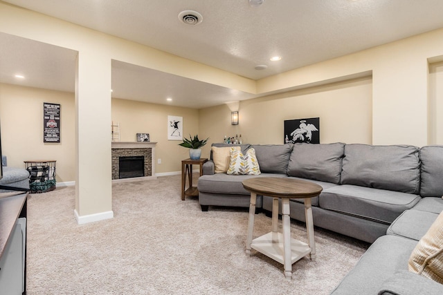 2063 Hayer Ct, Lewis Center, OH 43035 - living room with light carpet, recessed lighting, and a stone fireplace