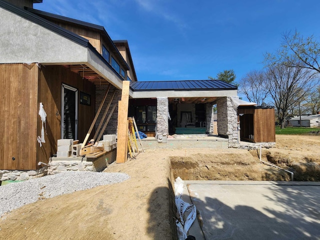 3134 Asbury Dr, Upper Arlington, OH 43221 - view of property exterior with a metal roof and a standing seam roof