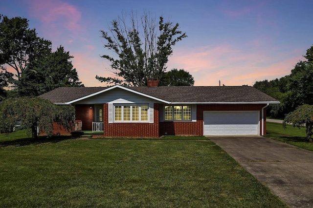 19 Kirby Rd, Heath, OH 43056 - ranch-style house featuring an attached garage, a front yard, brick siding, and driveway