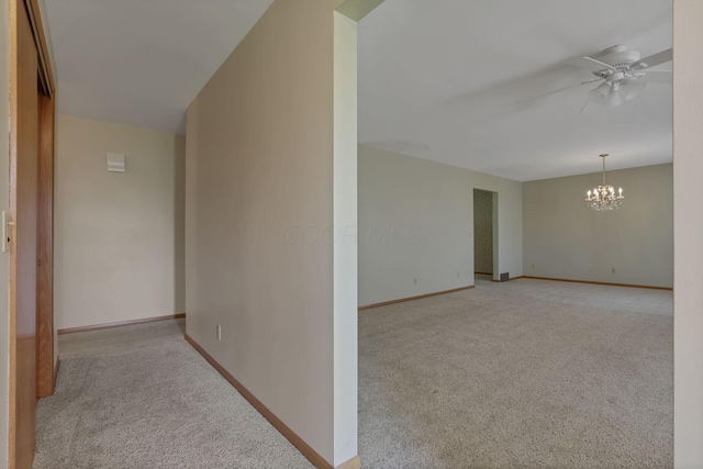 19 Kirby Rd, Heath, OH 43056 - hall with light colored carpet and a chandelier