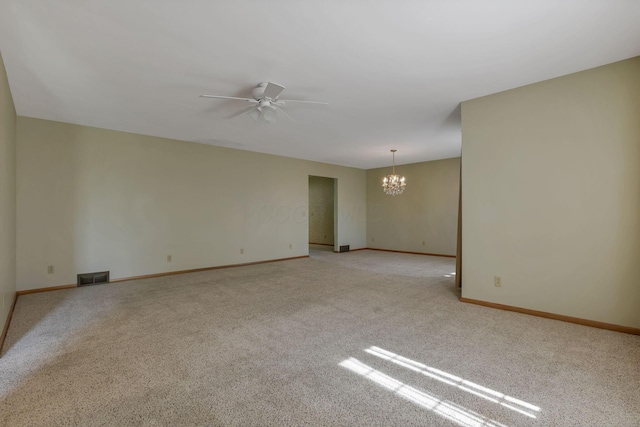 19 Kirby Rd, Heath, OH 43056 - spare room with ceiling fan, a chandelier, and light carpet
