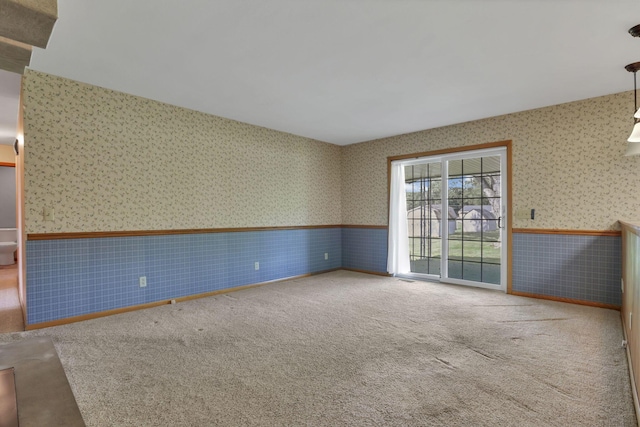 19 Kirby Rd, Heath, OH 43056 - carpeted spare room with wallpapered walls and wainscoting