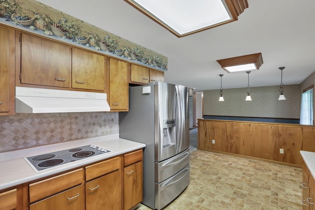 19 Kirby Rd, Heath, OH 43056 - kitchen featuring under cabinet range hood, stainless steel refrigerator with ice dispenser, electric stovetop, tasteful backsplash, and light countertops