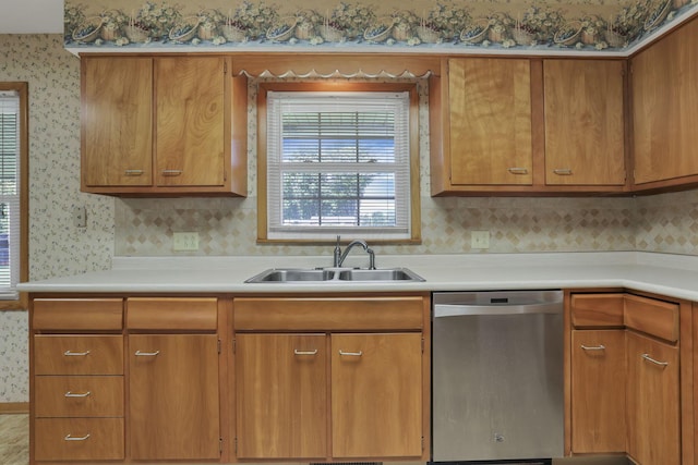 19 Kirby Rd, Heath, OH 43056 - kitchen with dishwasher, wallpapered walls, light countertops, brown cabinets, and decorative backsplash