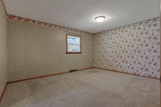 19 Kirby Rd, Heath, OH 43056 - empty room featuring carpet and wallpapered walls