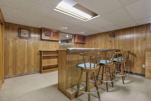 19 Kirby Rd, Heath, OH 43056 - indoor dry bar with wooden walls, a drop ceiling, and tile patterned floors