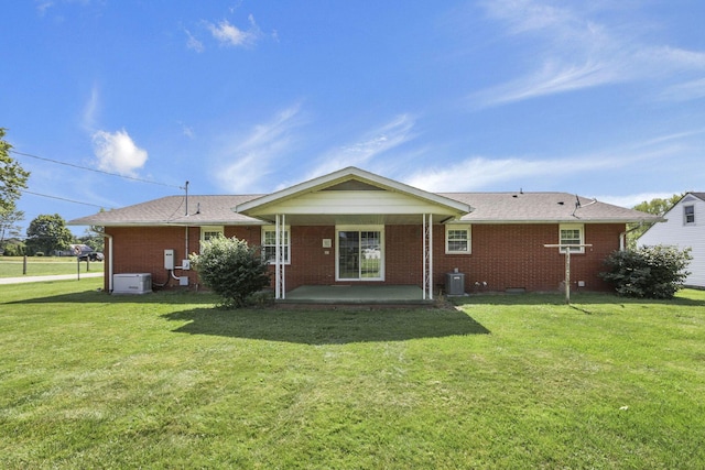 19 Kirby Rd, Heath, OH 43056 - back of house featuring a lawn and brick siding