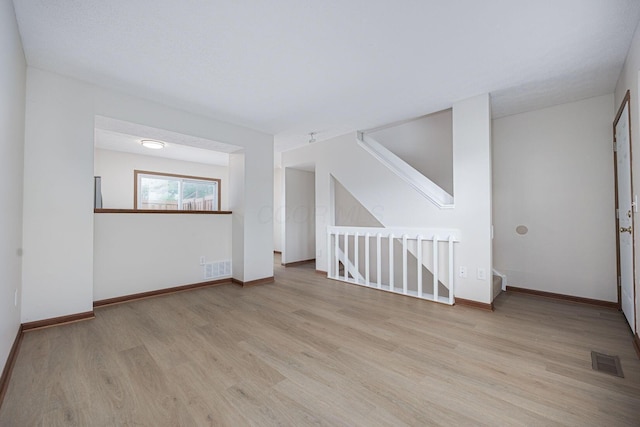 7599 Worth Galena Rd Unit 38, Worthington, OH 43085 - unfurnished room with light wood finished floors and baseboards
