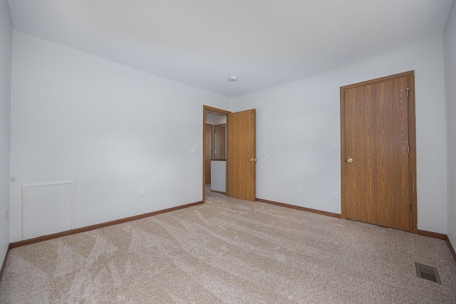 7599 Worth Galena Rd Unit 38, Worthington, OH 43085 - unfurnished bedroom featuring carpet flooring