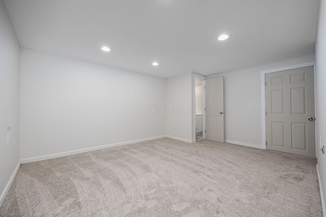 7599 Worth Galena Rd Unit 38, Worthington, OH 43085 - unfurnished bedroom featuring carpet flooring and recessed lighting