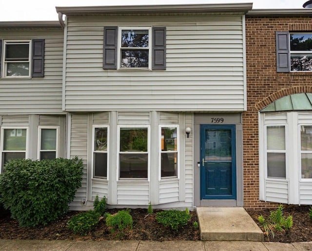 7599 Worth Galena Rd Unit 38, Worthington, OH 43085 - property entrance featuring brick siding