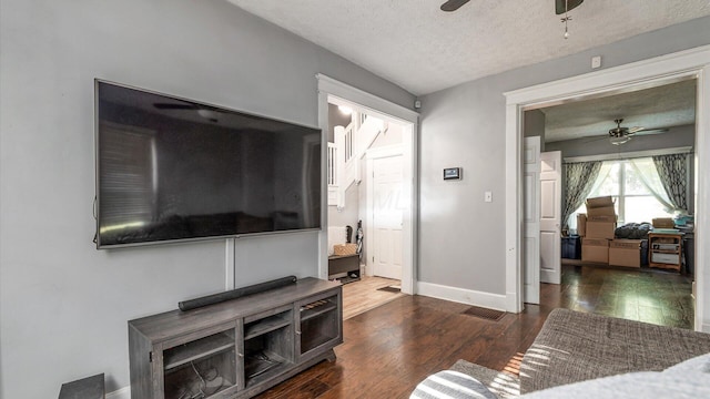 467 Mount Vernon Rd, Newark, OH 43055 - living area with ceiling fan, a textured ceiling, and wood finished floors