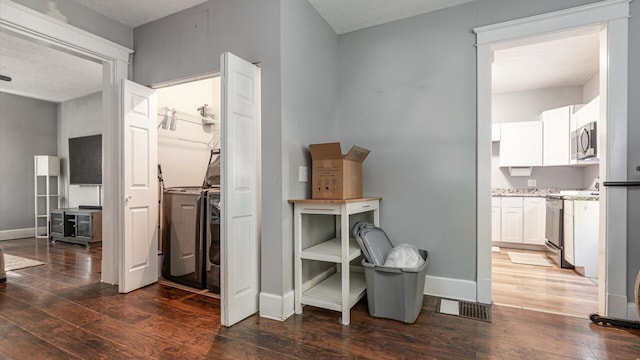 467 Mount Vernon Rd, Newark, OH 43055 - hall featuring wood-type flooring and washer / clothes dryer