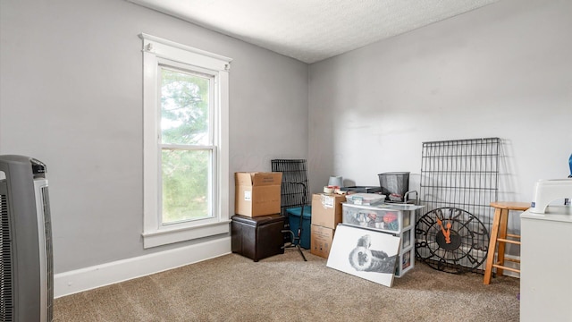 467 Mount Vernon Rd, Newark, OH 43055 - carpeted office space featuring heating unit and a textured ceiling