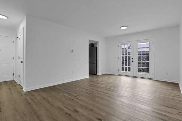 5781 Hallridge Cir Unit B, Columbus, OH 43232 - spare room featuring french doors and wood finished floors