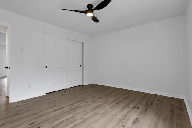 5781 Hallridge Cir Unit B, Columbus, OH 43232 - unfurnished bedroom with wood finished floors, a closet, and ceiling fan