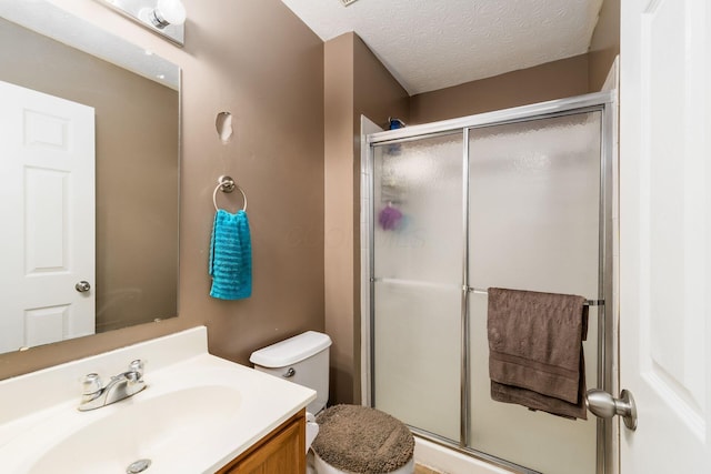 7787 Freesia St Unit 216, Blacklick, OH 43004 - full bathroom with vanity, a shower stall, and a textured ceiling