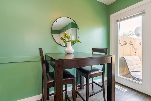 6447 Cranston Way Unit 19, Dublin, OH 43017 - dining room featuring wood finished floors and baseboards