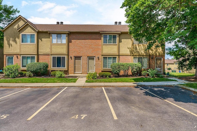 6447 Cranston Way Unit 19, Dublin, OH 43017 - view of property featuring uncovered parking