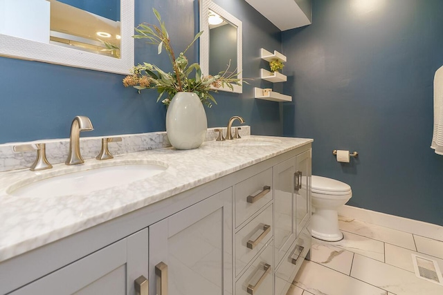 6447 Cranston Way Unit 19, Dublin, OH 43017 - bathroom featuring double vanity and marble finish flooring