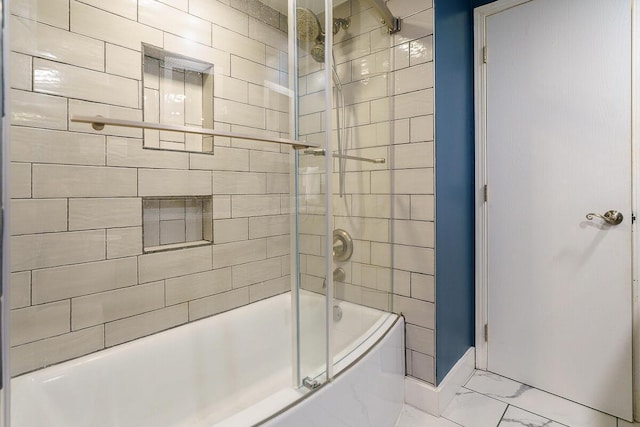 6447 Cranston Way Unit 19, Dublin, OH 43017 - bathroom featuring marble finish flooring and enclosed tub / shower combo