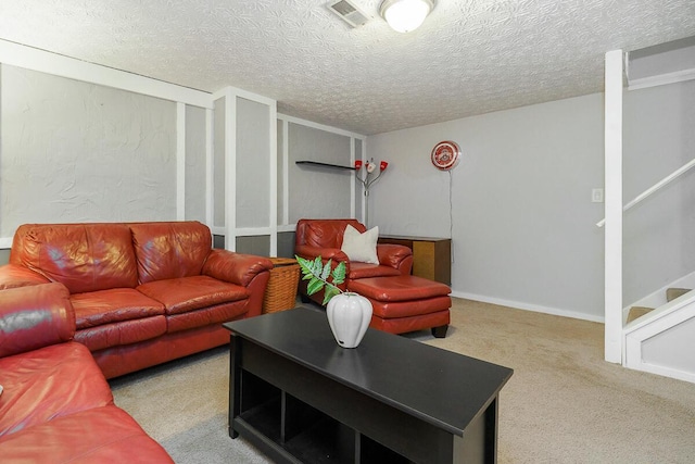 6447 Cranston Way Unit 19, Dublin, OH 43017 - carpeted living room with stairs and a textured ceiling